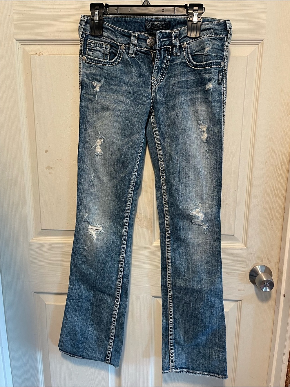 Silver Jeans Distressed Blue Flare Jeans